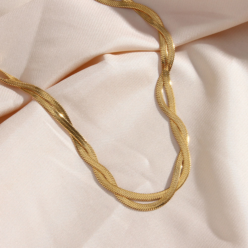 Twisted armband | 18K Goud 4mm