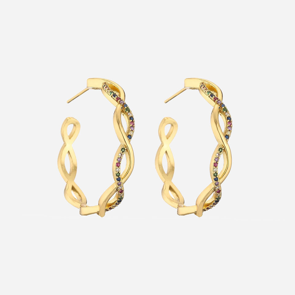 Isa wave oorbellen | 18K Goud