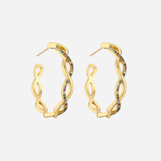 Isa wave oorbellen | 18K Goud