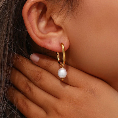 Rosa oorbellen | 18K Goud